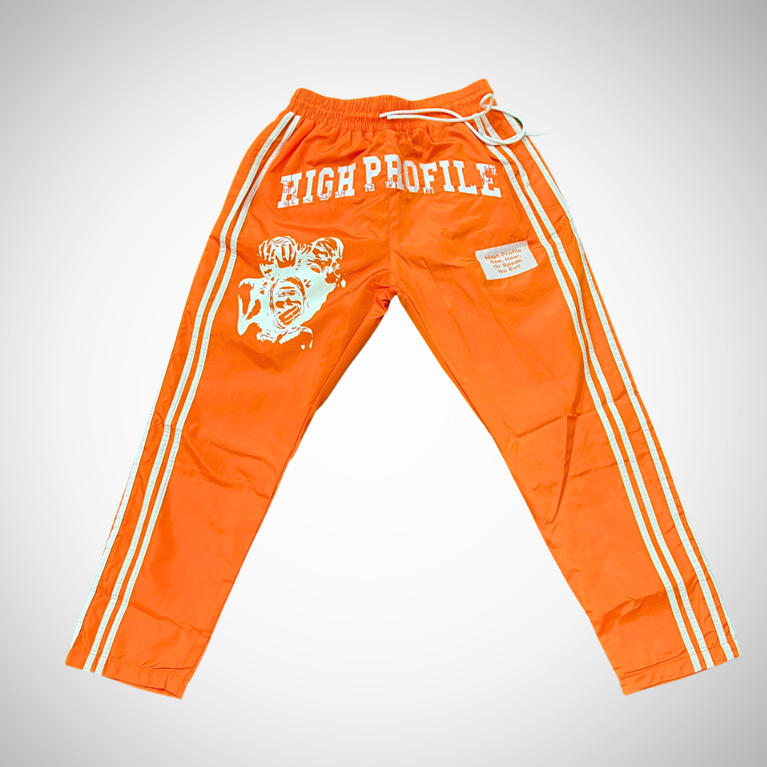 See No Evil Windbreaker Pants — cream/orange